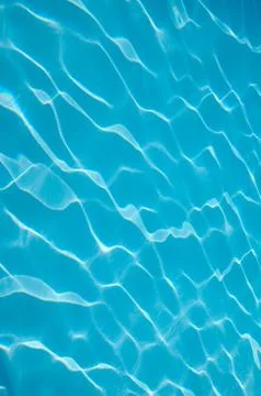 Swimming pool reflections of light through water Stock Photos