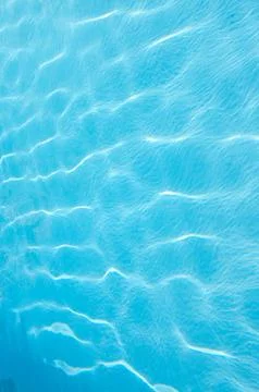 Swimming pool reflections of light through water Stock Photos