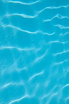 Swimming pool reflections of light through water Stock Photos