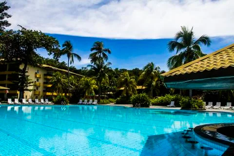 Swimming pool at a resort Stock Photos