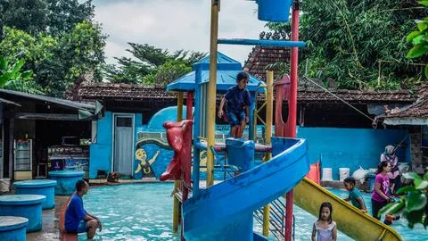 Swimming pool rides Stock Photos