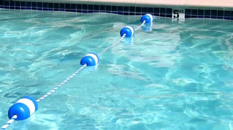 Swimming pool safety rope divider., Stock Video