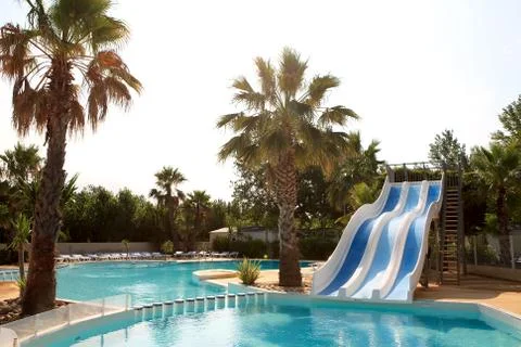 Swimming pool with slides Stock Photos