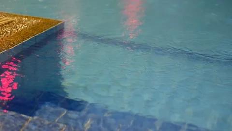 Swimming pool stairs, rain drops Stock Footage 90875455