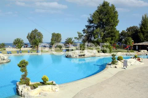 Swimming pool summer vacation scene Stock Photos