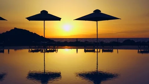 Swimming pool at sunset Stock Footage 72650041