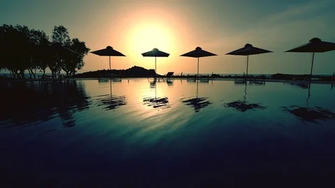 Swimming pool at sunset Stock Footage 72656597