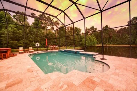 Swimming Pool at Sunset Stock Photos