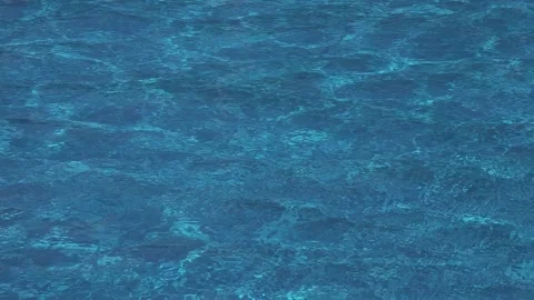 Swimming Pool Surface with Clear Blue Water Stock Footage 171840701