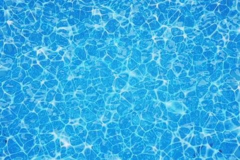 Swimming pool surface with light reflection background or texture Stock Photos