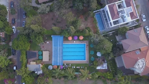 Swimming Pool top shot crane down Stock Footage 86151983