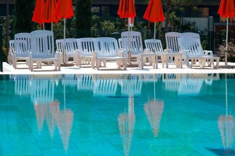 Swimming Pool with Umbrellas Stock Photos