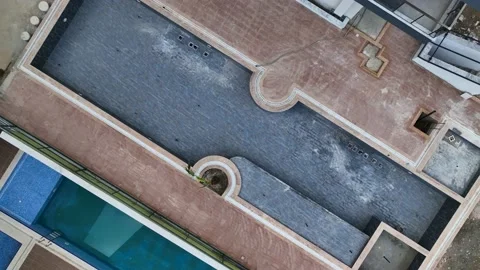 Swimming pool under construction aerial view, premium residential complex 4 K Stock Footage 231436161