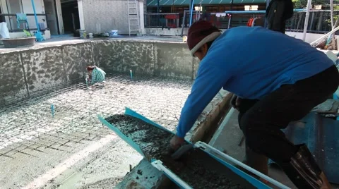 Swimming pool under construction, being sprayed on rebar for new swimming pool Stock Footage 59949148