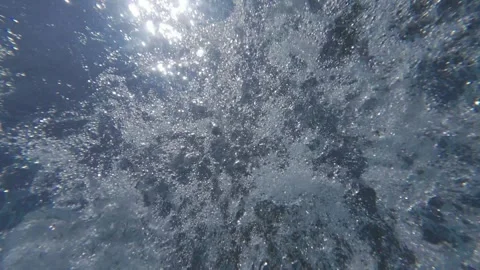 Swimming pool water bubbles texture in sun background in slow motion Stock Footage 346080098