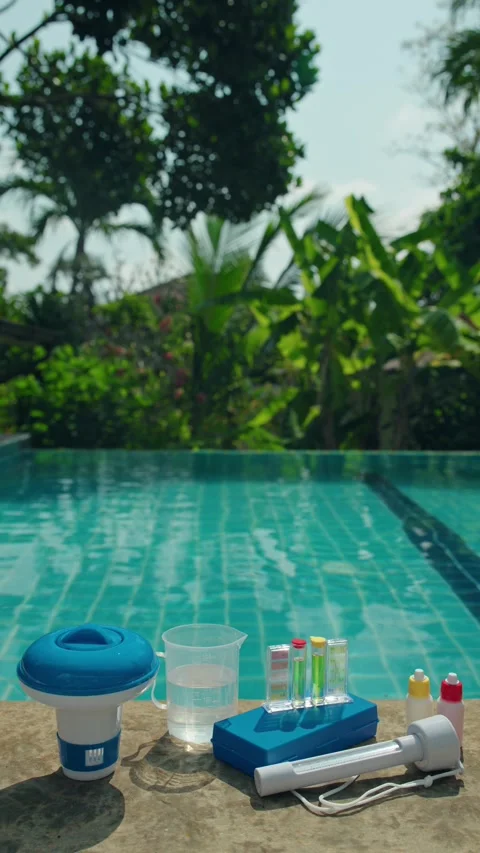 Swimming pool water maintenance kit with chemical tester floating dispenser.. Stock Footage 334911526