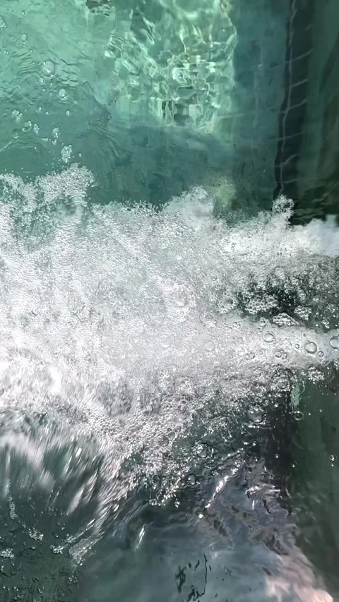 Swimming pool water splashes and bubbles from different angles Stock Footage 332936139