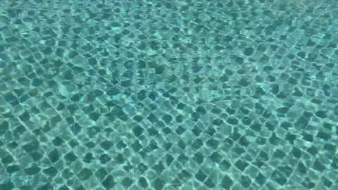 Swimming pool water wave motion 4K 스톡 동영상 130932816