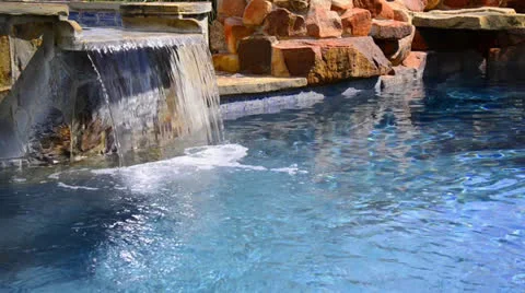 Swimming pool waterfall Stock Footage 24674525