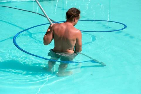 Swimming Pool Worker Cleaning Pool Floor in Kyiv Stock Photos
