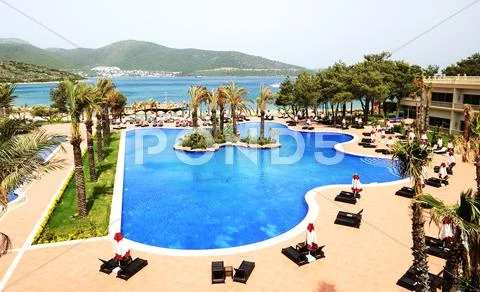 Swimming pools and beach at luxury hotel, bodrum, turkey Stock Photos