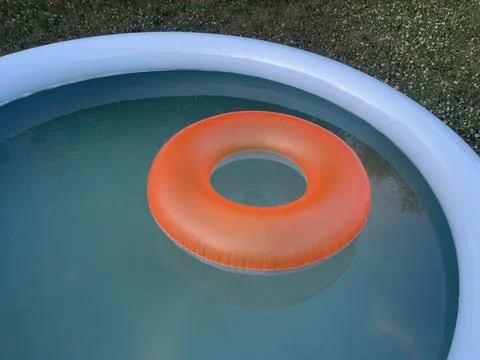 Swimming ring float in pool water Stock Photos