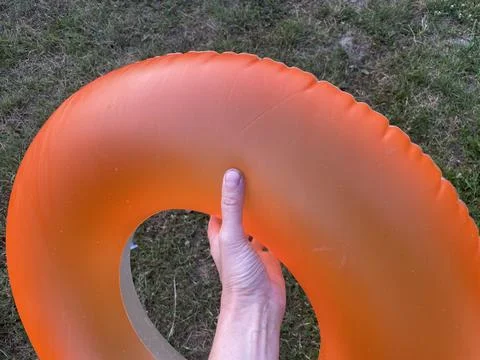 Swimming ring float in pool water Stock Photos