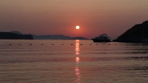 Swimming at sunset 스톡 동영상 80679231