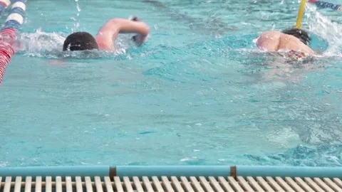 Swimming team practicing at the olympic pool Stock Footage 170725375