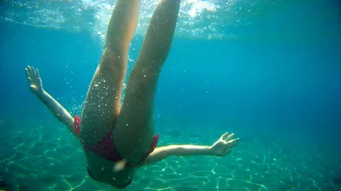 Swimmning underwater Stock Footage 97272181