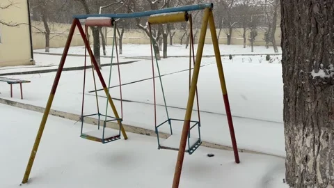 Swing in the abandoned city Stock Footage 230016041