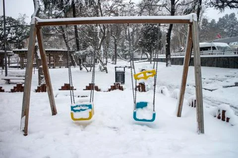 Swing and winter Stock Photos