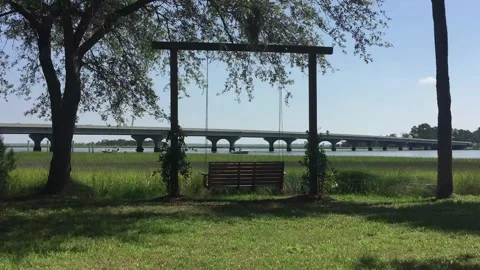 A Swing at the Beach 库存影片 134977989