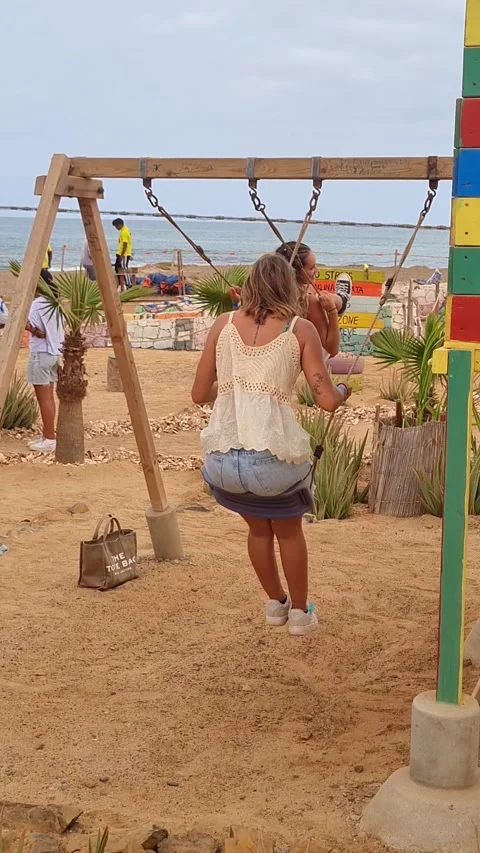 Swing on the beach Stock Footage 291017500