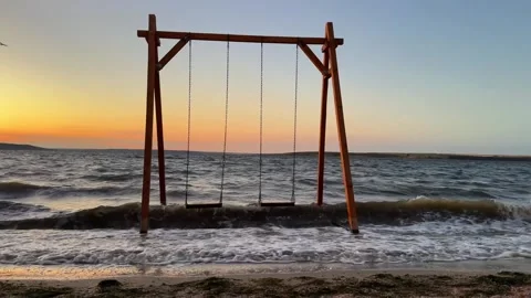 Swing on the beach Stock Footage 316119124