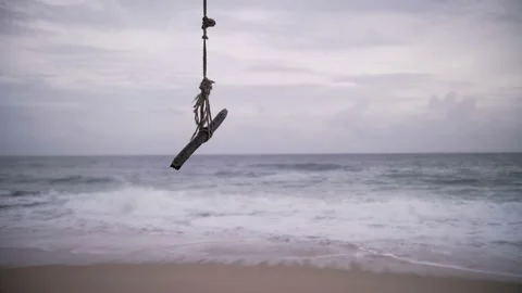 Swing on the beach made of rope and sticks Stock Footage 198398884