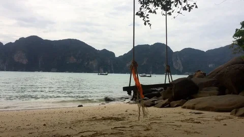 Swing on the beach of phi hpi island Stock Footage 92425713