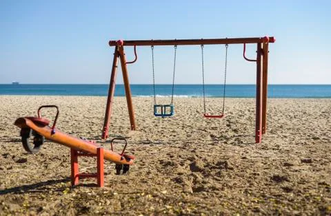Swing on the beach Stock Photos