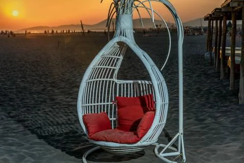 The swing on the beach in the sunset Foto stock