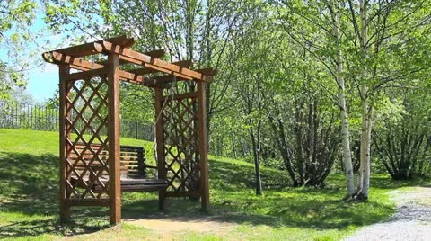 Swing bench in the park Stock Footage 12123138