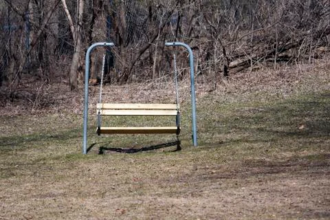 Swing bench in the park Stock Photos