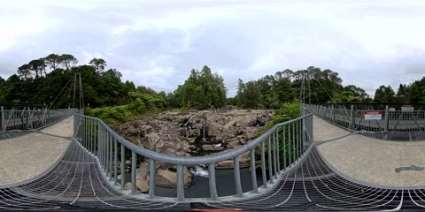 Swing Bridge Over Rocky River - VR360 360-Degree Panoramic View in New Zealand Stock Footage 331552355