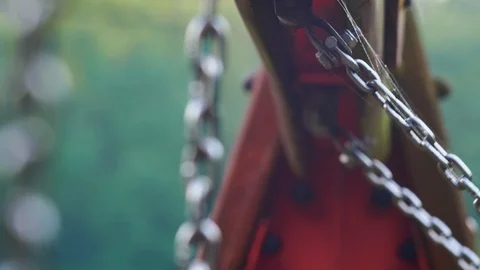 Swing Chains Swinging Back and Forth Close Up Slow Motion Stock Footage 117336122