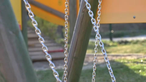 Swing Chains Swinging Back and Forth Close Up Slow Motion Stock Footage 155836030