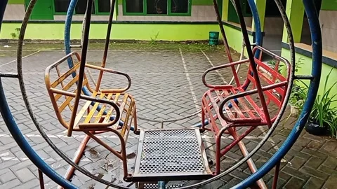Swing chair in the school yard Stock Footage 296519039