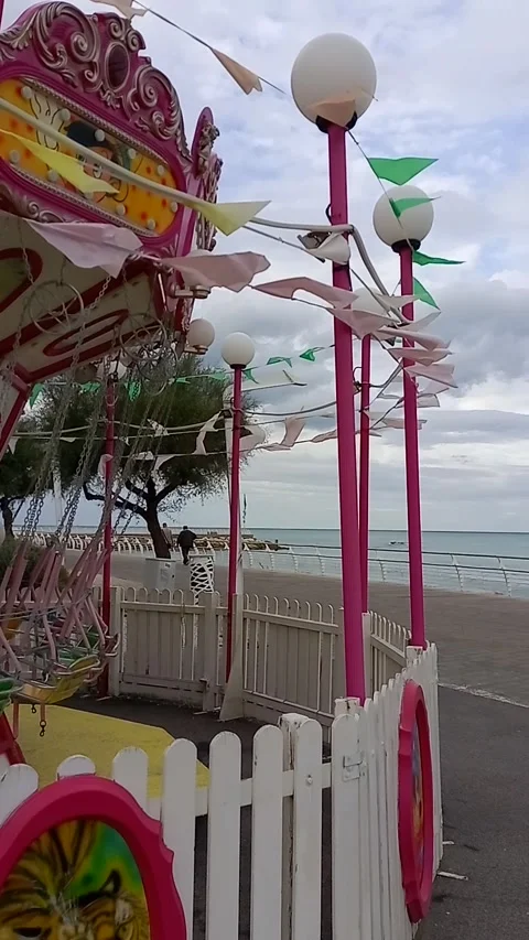 Swing chairs carousel near the seafront Video stock 255454409