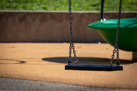 Swing in a children's park Stock Photos