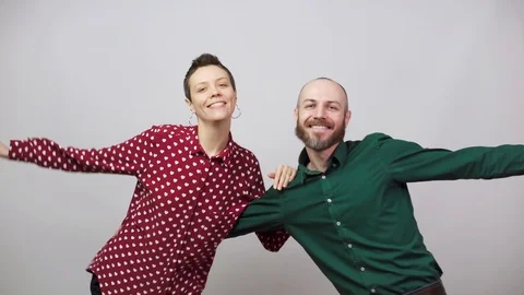 Swing dancers on white background. Man and woman are dancing lindy hop or boogie Video stock 124167939