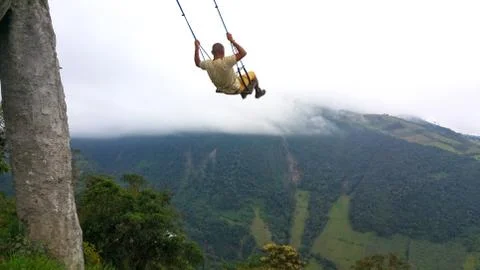 The Swing At The End Of The World Located At Casa Del Arbol, The Tree House In Stock Photos