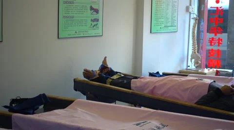 Swing feet,teasing spine,new style physical therapy,guangzhou,china Stock Footage 57671325